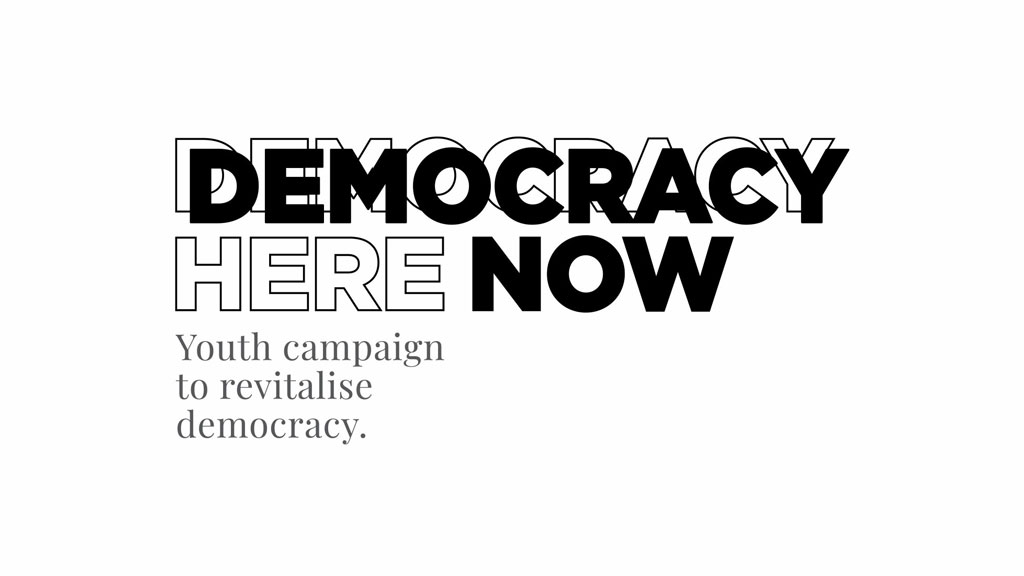 DemocracyHereDemocracyNow Logo BlackEN Scaled
